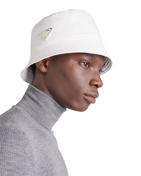 prada visor|white Prada bucket hat.